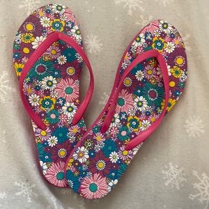 Pink flower pattern flip flops